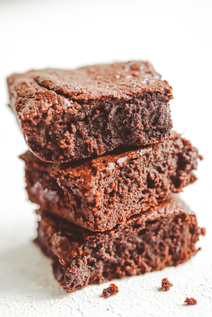 Classic fudgy brownies have that iconic shiny crinkle top and the perfect fudgy center