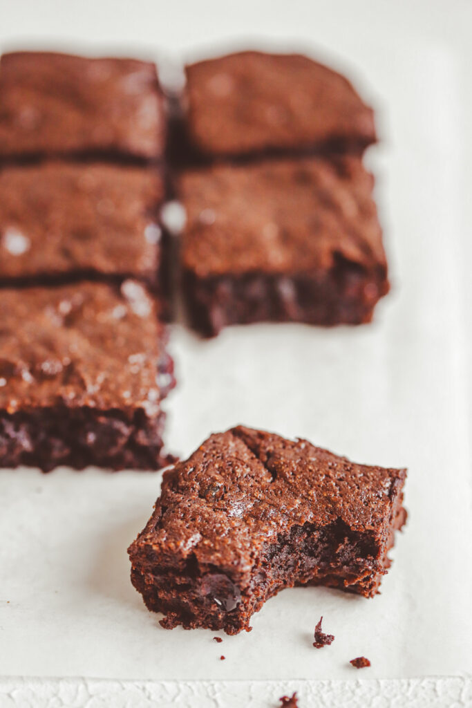 Classic fudgy brownies have that iconic shiny crinkle top and the perfect fudgy center