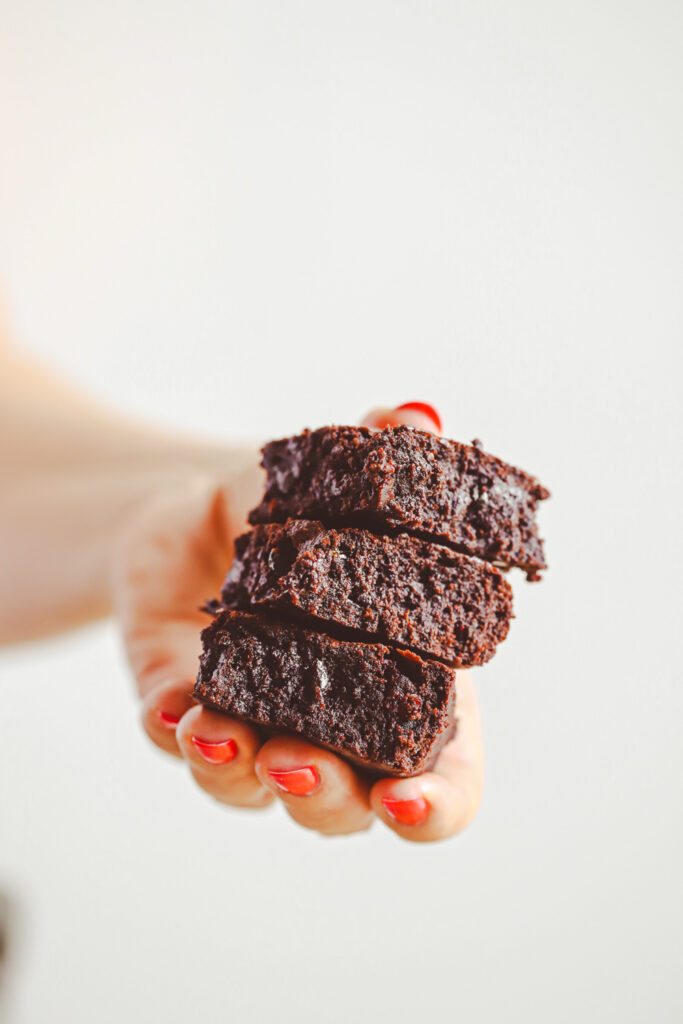 Classic fudgy brownies have that iconic shiny crinkle top and the perfect fudgy center