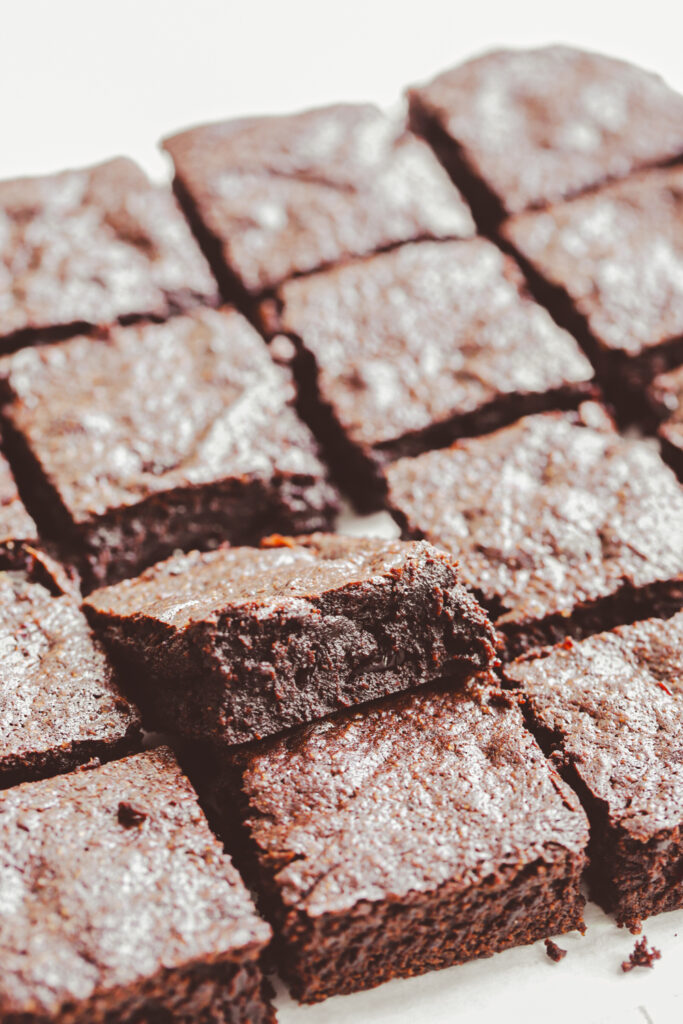 Classic fudgy brownies have that iconic shiny crinkle top and the perfect fudgy center
